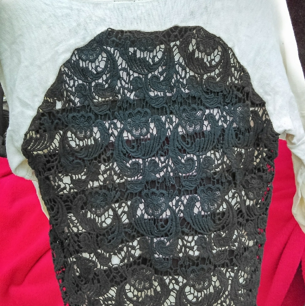 Beautiful knit top with lace back